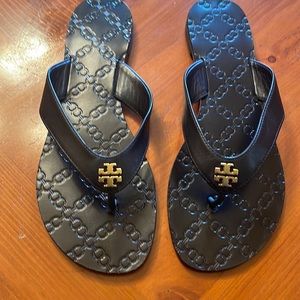 Authentic Black Tory Burch slides. Great Condition. Size 8.5